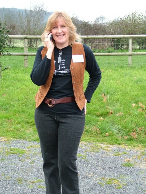 Anne giving directions on the phone with Philip