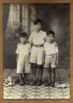 Three kids, a toy dog and a toy cat